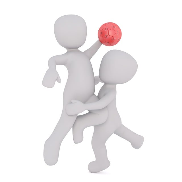 ハンドボールの練習中にストレッチをする選手たち