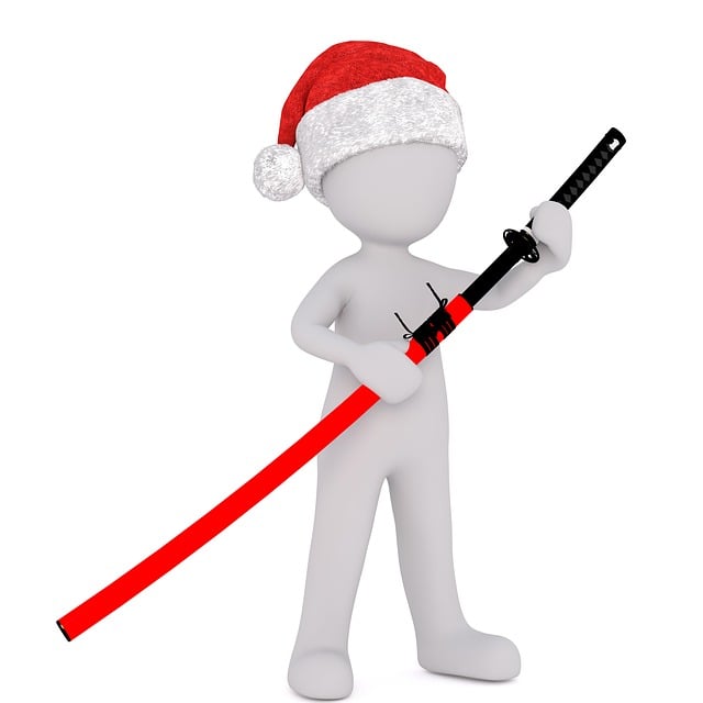 剣道の稽古風景、指導者が初心者に基本動作を教えている