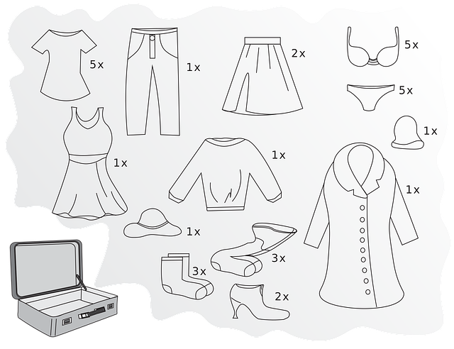 ピクニック中に突然の雨に見舞われ、慌てて荷物を片付ける人たち