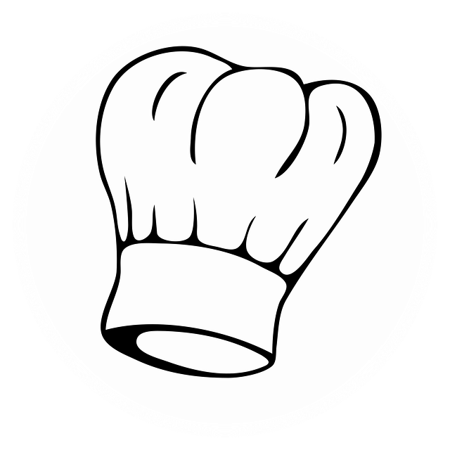 清潔なキッチンで調理する人の手元